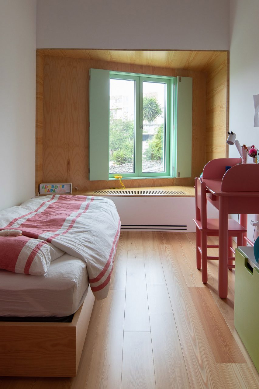 colourful window frames in bedroom in Porto home