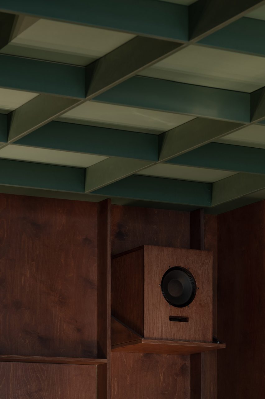 OJAS speaker beneath a green-painted coffered ceiling by Mirzoyan Studio