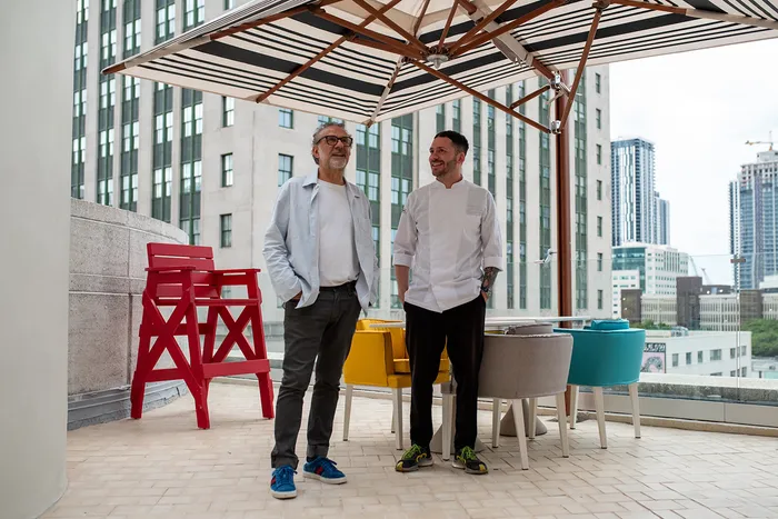 Massimo Bottura and Bernardo Paladini on the Torno Subito roof.