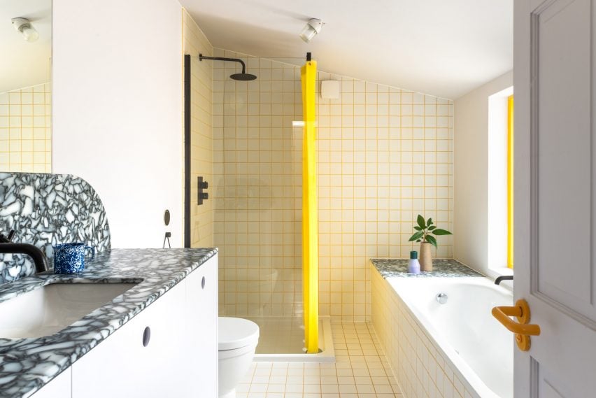 Mo-tel House by Office S&M with yellow shower curtain