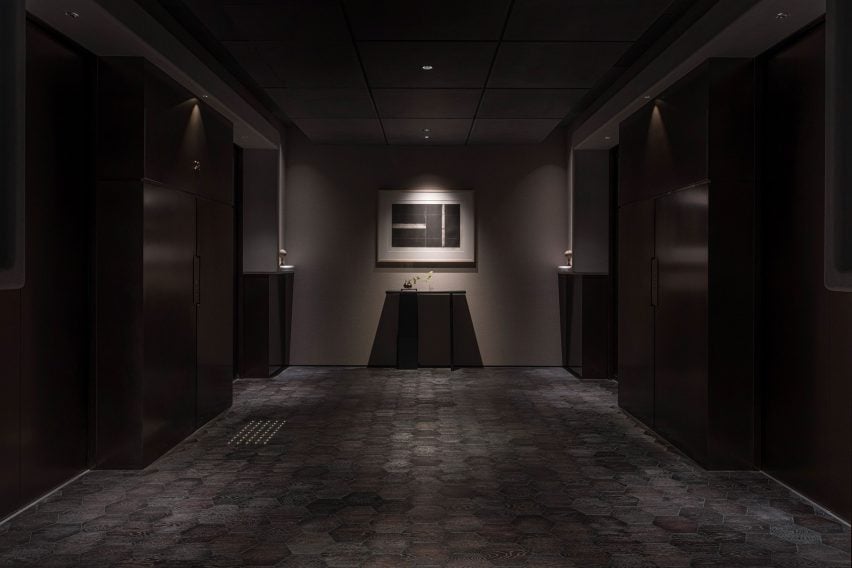 Darkened hallway in a hotel designed by Simplicity