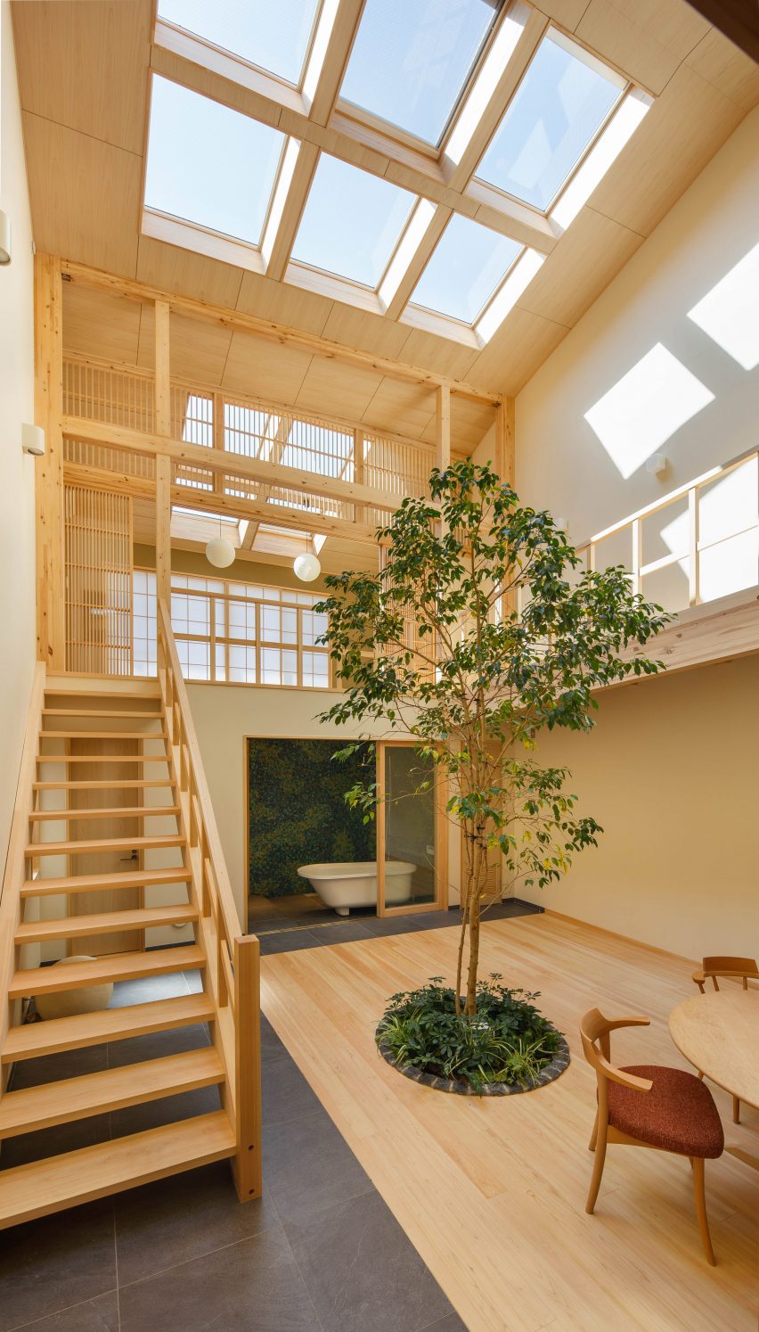 07Beach arrange Kyoto home around glass-fronted bathroom