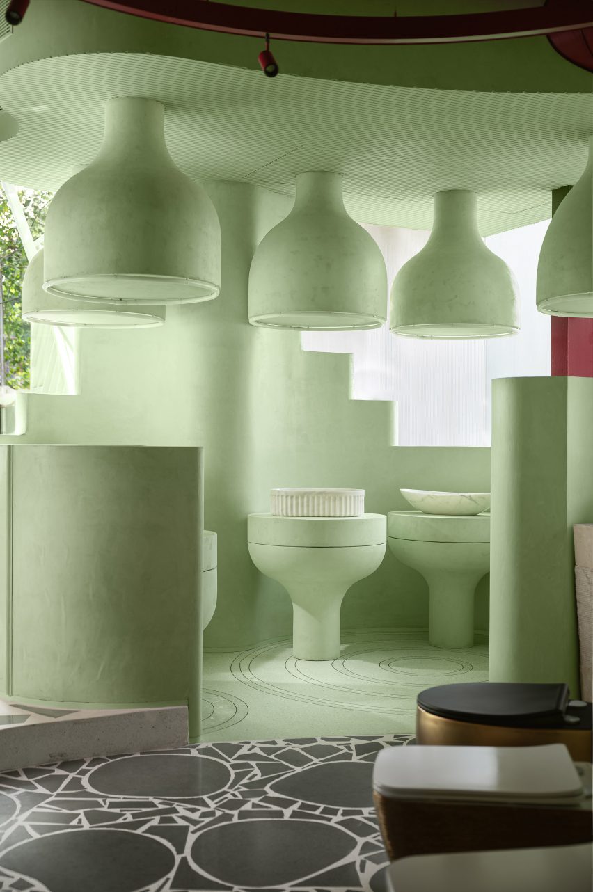 Mint-green interiors of a bathware showroom in Mumbai by MuseLAB.