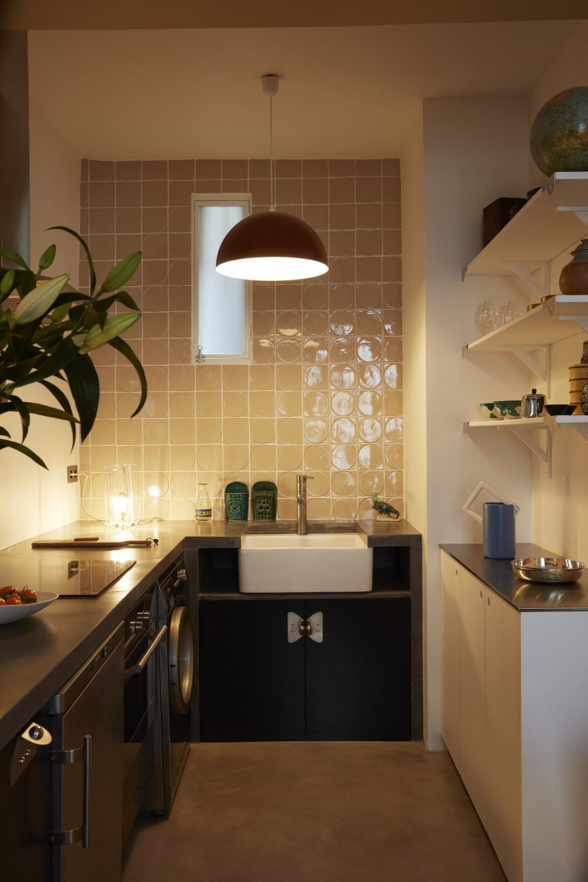 Kitchen in Paris pied-à-terre by The House Special Studio.