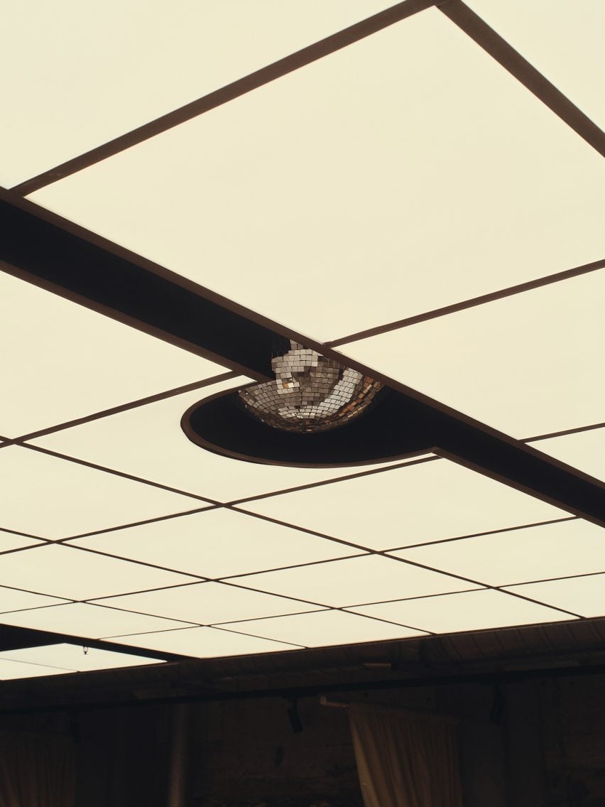 Disco ball coming out of ceiling of restaurant in Brisbane designed by J.AR Office