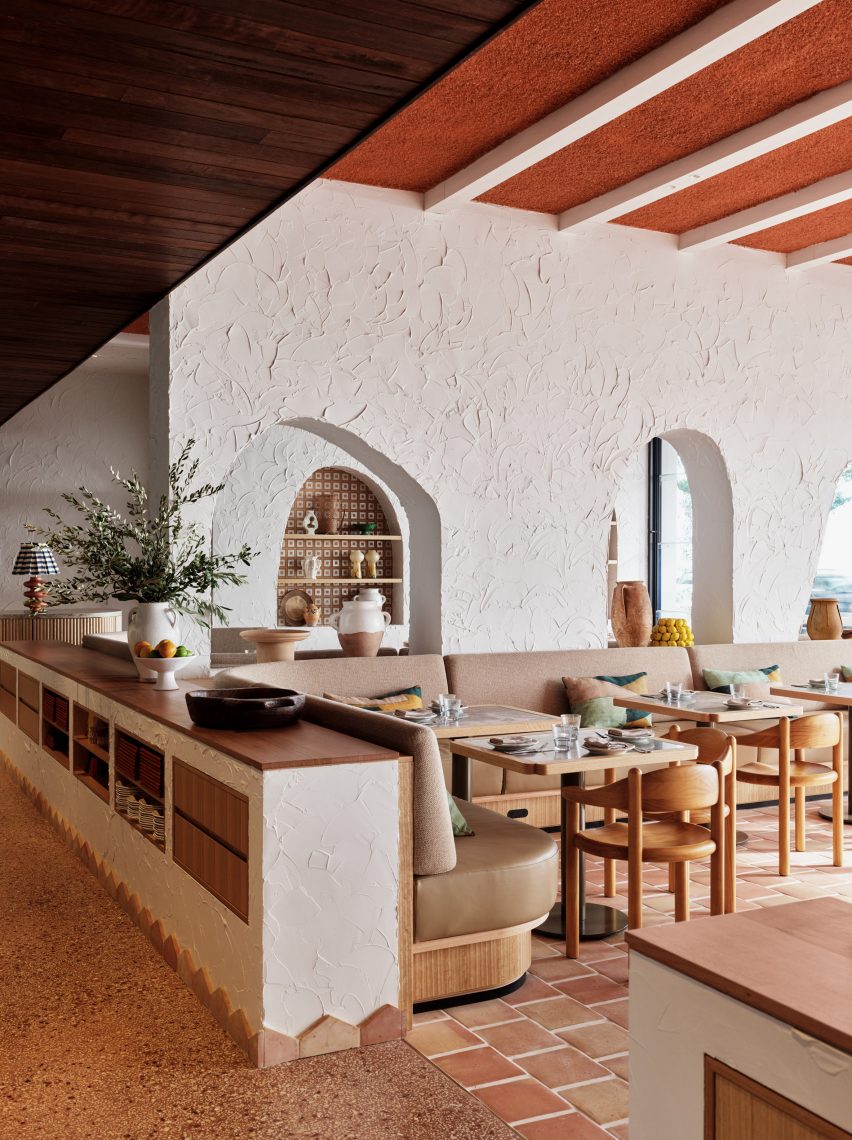 Arched openings and patterned tiled floors in restaurant
