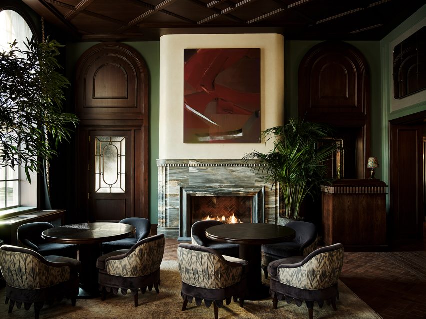Dark wood panelling and furniture in a parlor room