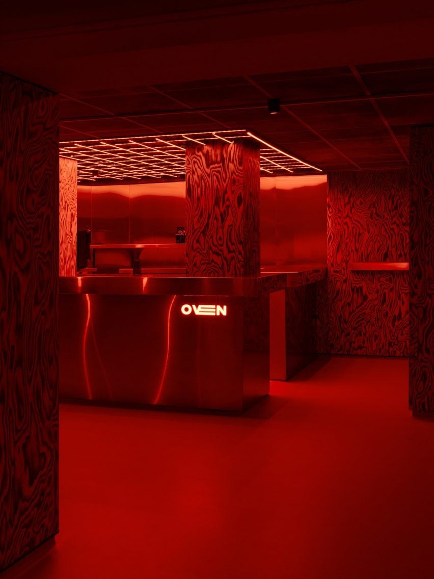 Red-lit nightclub interior