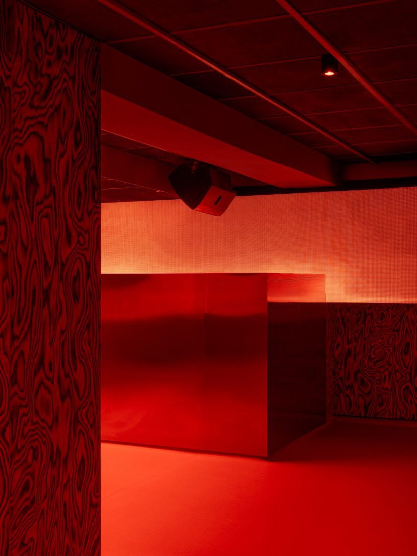 Red-lit nightclub interior