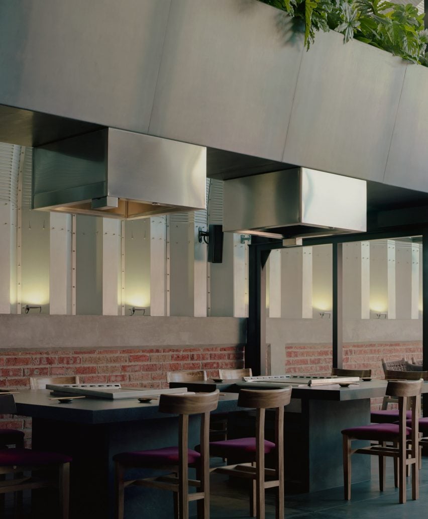 Metal vents above dining area