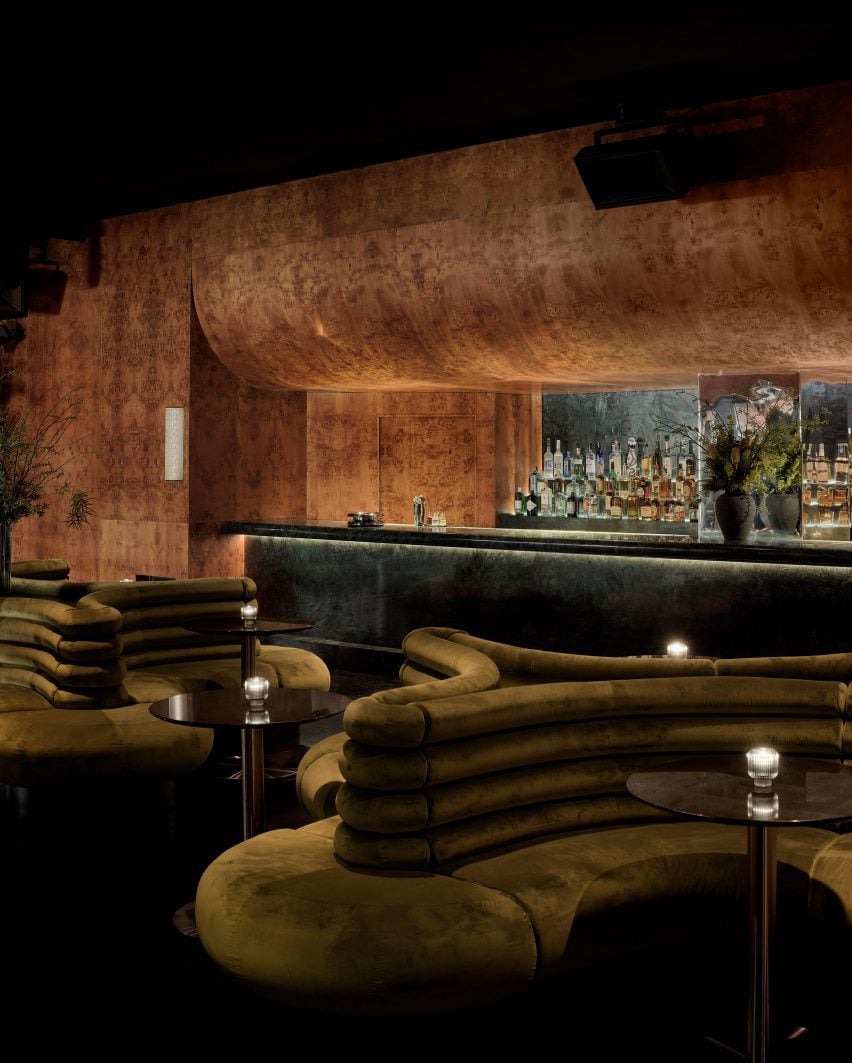 Bar and lounge area with burl wood veneer panelling