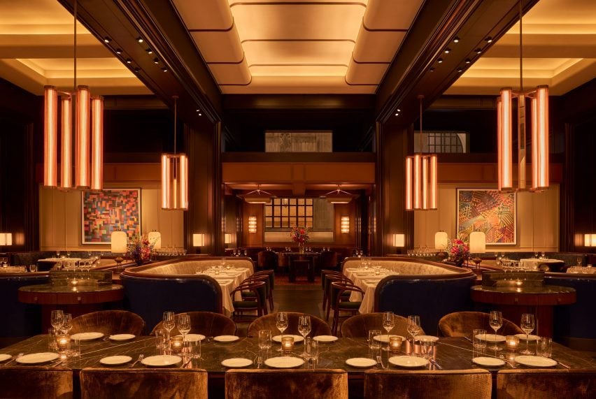 The main dining room with a symmetrical layout and tall stepped ceilings