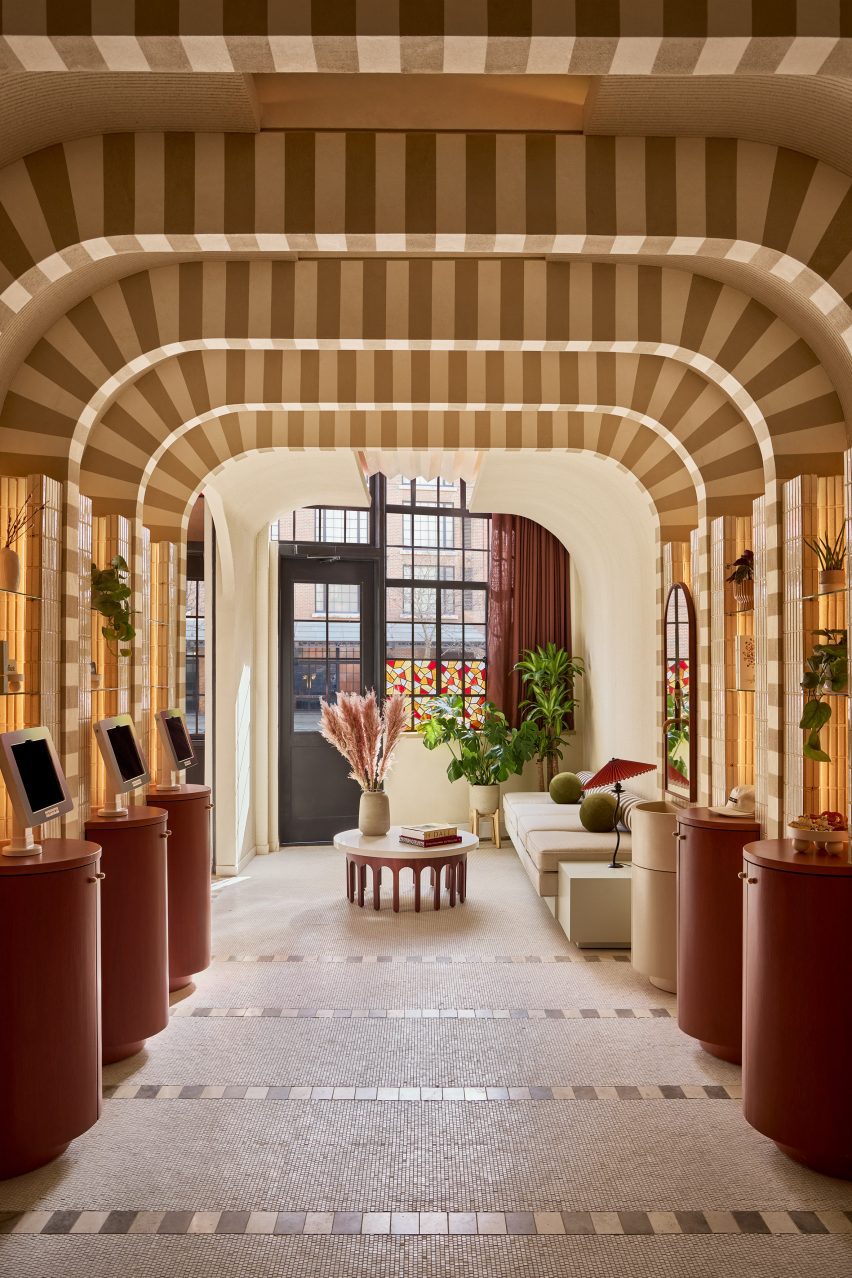 Hotel lobby featuring striped portals