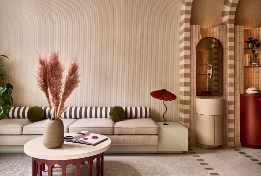 Lobby seating area with and earth-toned palette of textured materials