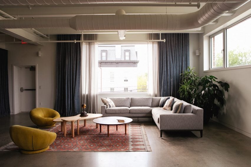 A spacious living area in a loft-style space