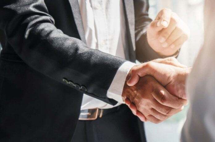 AdobeStock_309873155-business-handshake-stock
