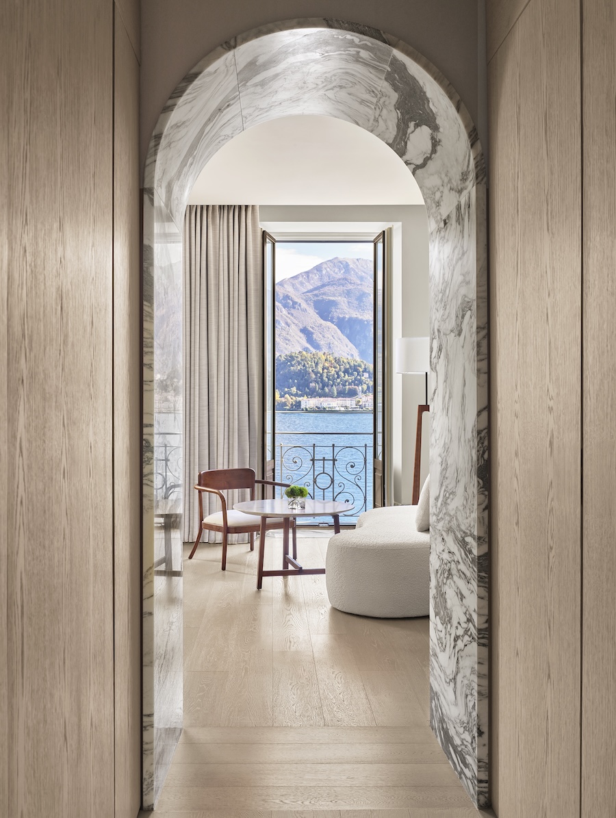 The Lake Como EDITION Cadenabbia Italy restored 19th century palazzo neri&hu de.tales mountain lake view guestroom marble archway doorway
