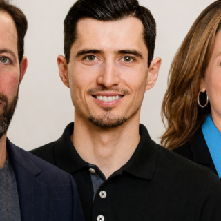 Three professionals smiling for a group portrait: left man in navy blazer, center man in black polo, right woman in blue blouse with hoop earrings?