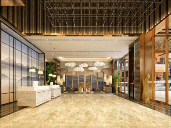 Luxurious hotel lobby with marble floors, a white reception desk, and seating area under cloud-shaped pendant lights.