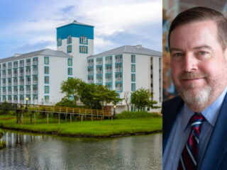 Lakeside white hotel with blue accents and a wooden walkway, beside a headshot of a smiling man in a blue suit.