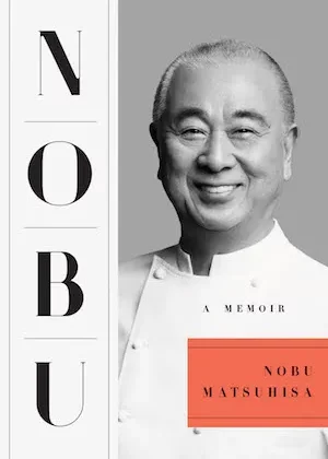 Book cover showing a black-and-white photo of Nobu Matsuhisa smiling on a gray background, with vertical 'NOBU' letters on the left and an orange rectangle containing 'NOBU MATSUSHISA' beneath a small 'A MEMOIR' subtitle.