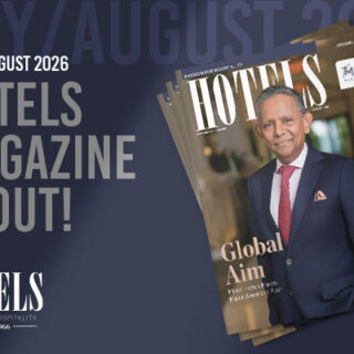 Announcement banner for Hotels Magazine July/August 2026 with a stacked magazine cover showing a man in a navy suit and red tie on the front.