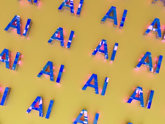 Pattern of blue 3D letter A shapes with pink glow on a yellow background.