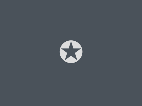Award badge icon: white circle with five-pointed star on a dark blue-gray background