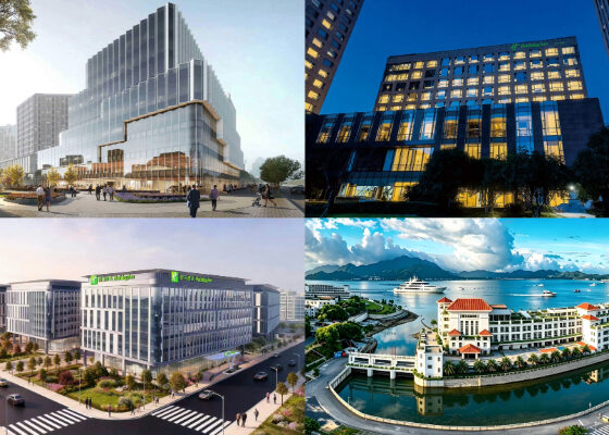 Modern glass office building with a stepped design and people in a plaza in front of it, daytime take.