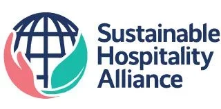 Sustainable Hospitality Alliance logo with a globe cradled by pink and teal hands, next to the organization name.