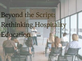 Presenter addresses an audience in a bright, modern space with large windows; overlay text reads 'Beyond the Script: Rethinking Hospitality Education'.