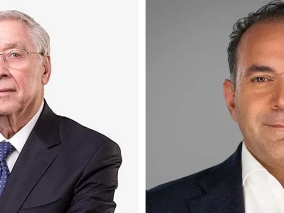 Side-by-side headshots of two men in business attire: left, an older man with glasses in a dark suit; right, a man with dark hair in a dark blazer.