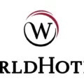 WorldHotels logo: black W inside a maroon circular swoosh, with 'WorldHotels' in large serif lettering below.