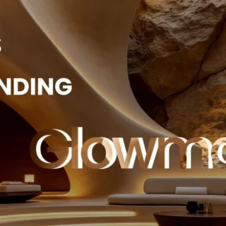 Lobby of a luxurious cave hotel with curved sandstone walls, warm ambient lighting, and modern seating; large white headline text overlaid about how hotels are responding to Glowmads (caption-like). Actress? (informative)