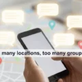 Hands holding a smartphone over a map with colorful location pins and chat bubbles, illustrating too many locations and group chats.