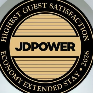 JD Power badge: Highest Guest Satisfaction for Economy Extended Stay, 2026 (circular black-gold award).