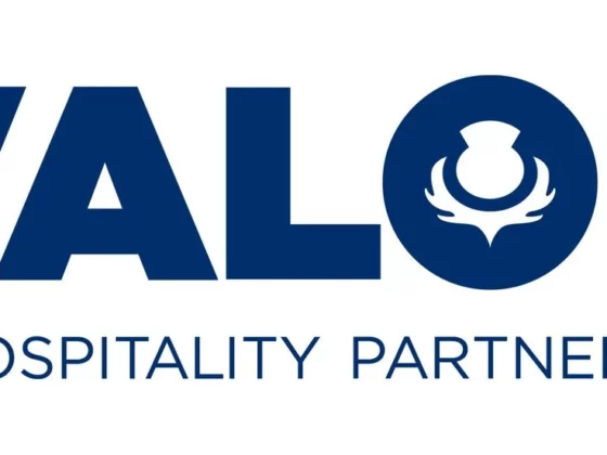 Valor Hospitality Partners logo: bold blue VALOR with a circular crest inside the O and 'HOSPITALITY PARTNERS' text below.