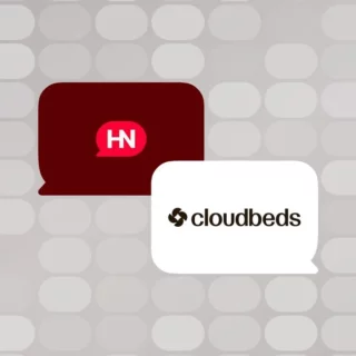 Overlapping speech bubbles featuring the Hackernoon (HN) logo in red and the Cloudbeds logo on a gray patterned background.