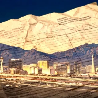 Night city skyline with mountains, overlaid by a crumpled sheet of paper containing text.