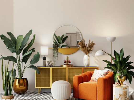 Living room corner with an orange velvet sofa, round mirror above a yellow credenza, and large green plants against a light wall.