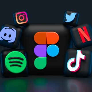 Close-up of glossy 3D app icons (Instagram, Twitter, Netflix, TikTok, Discord, Spotify) on a black cube surface, centered.