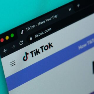 Browser tab showing the TikTok homepage with the TikTok logo and URL (tiktok.com).