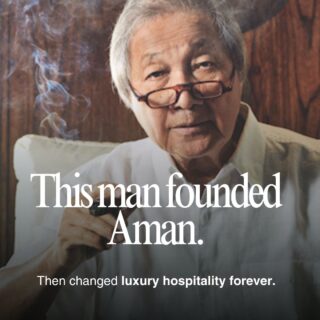 Portrait of an elderly man with glasses smoking, overlaid with text about founding Aman and transforming luxury hospitality.