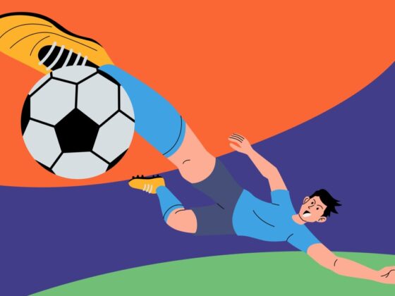 Soccer goalkeeper dives to block a large soccer ball on a colorful abstract background, mid-save pose, feet off the ground.