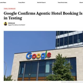 Google logo on the facade of a modern beige office building with glass windows and a tree in front