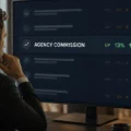 Businessman analyzes a financial dashboard showing 'AGENCY COMMISSION' rising 13% in green on a large monitor.