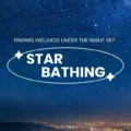 Logo for Star Bathing: 'Finding wellness under the night sky' with an oval ring and star icons over a starry night sky.