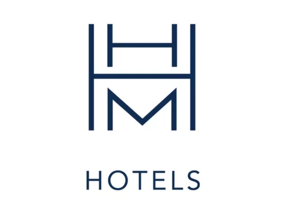 Brand logo with a navy blue geometric HM monogram above the word HOTELS.